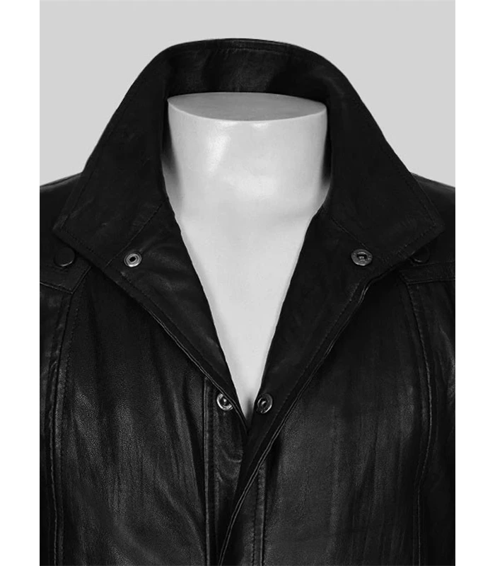 Black leather jacket on a mannequin against a gray background