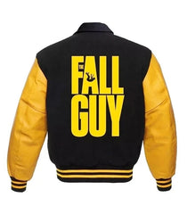 Black and yellow varsity jacket with 'The Fall Guy' text on the back